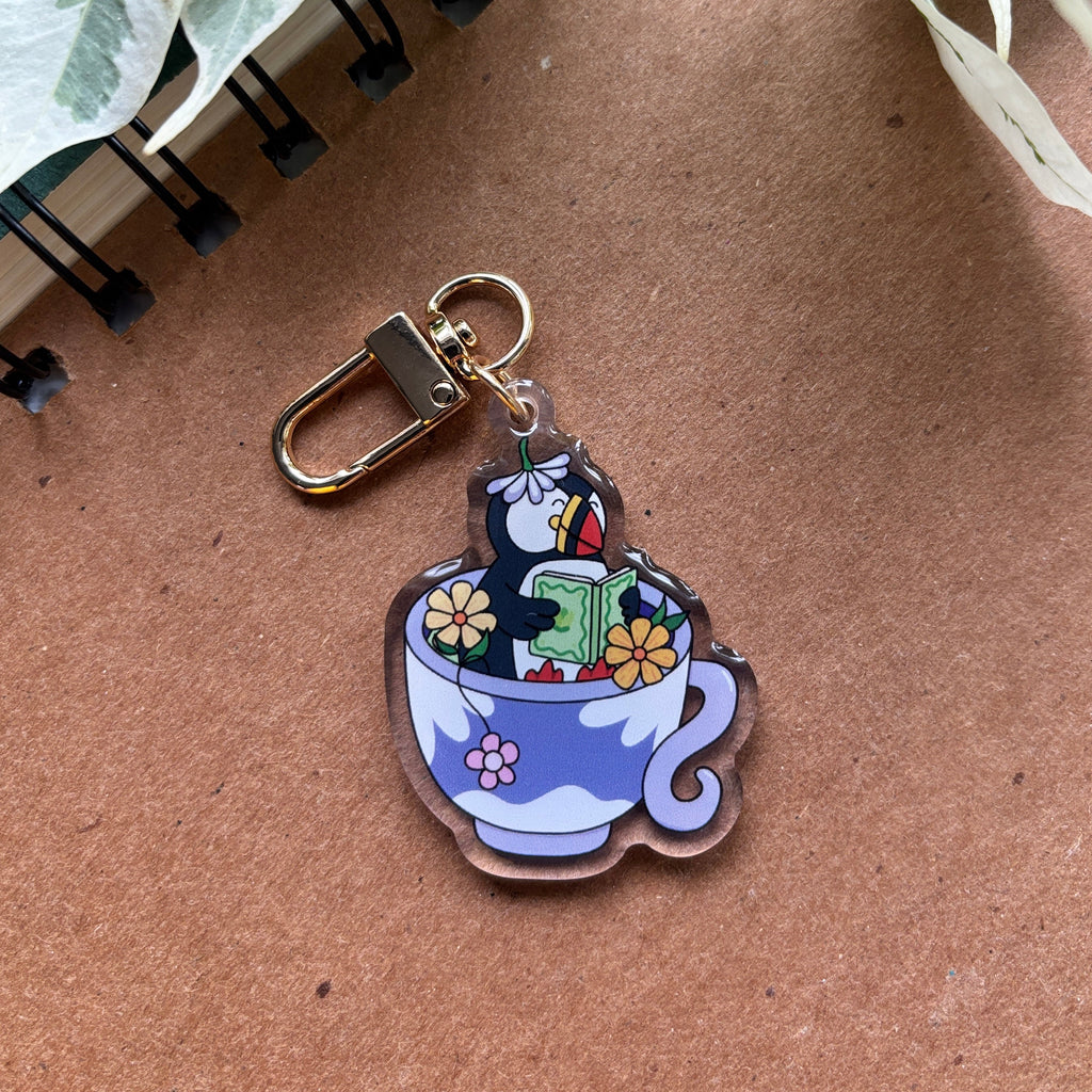 Keychain with cartoon design on a brown surface