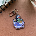 Keychain with cartoon design on a brown surface