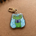 Cozy Froggy Reading Acrylic Keychain