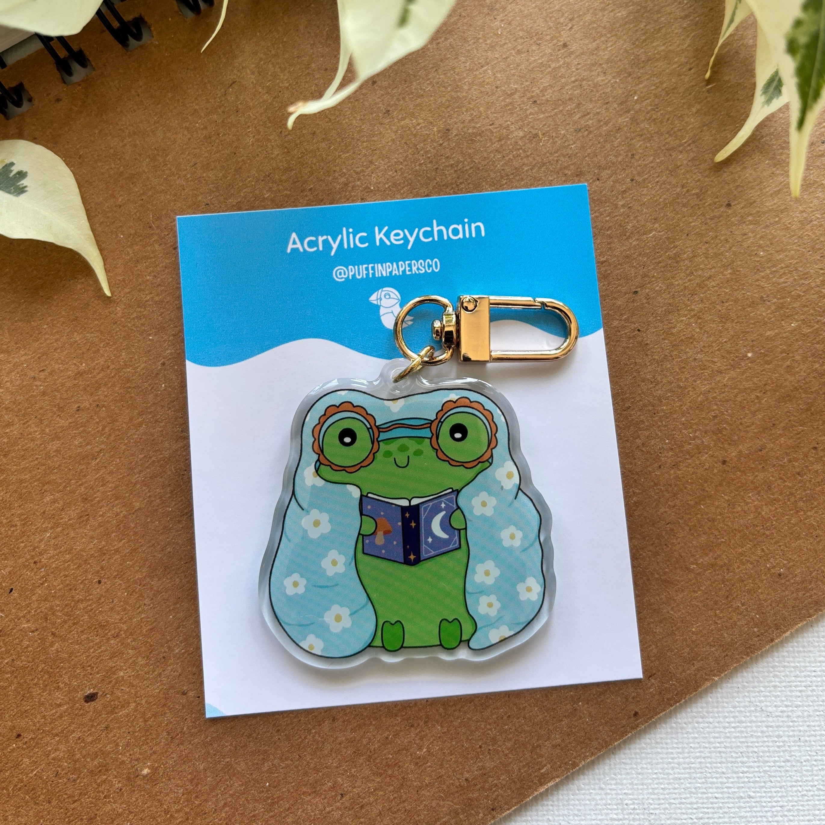 Cozy Froggy Reading Acrylic Keychain