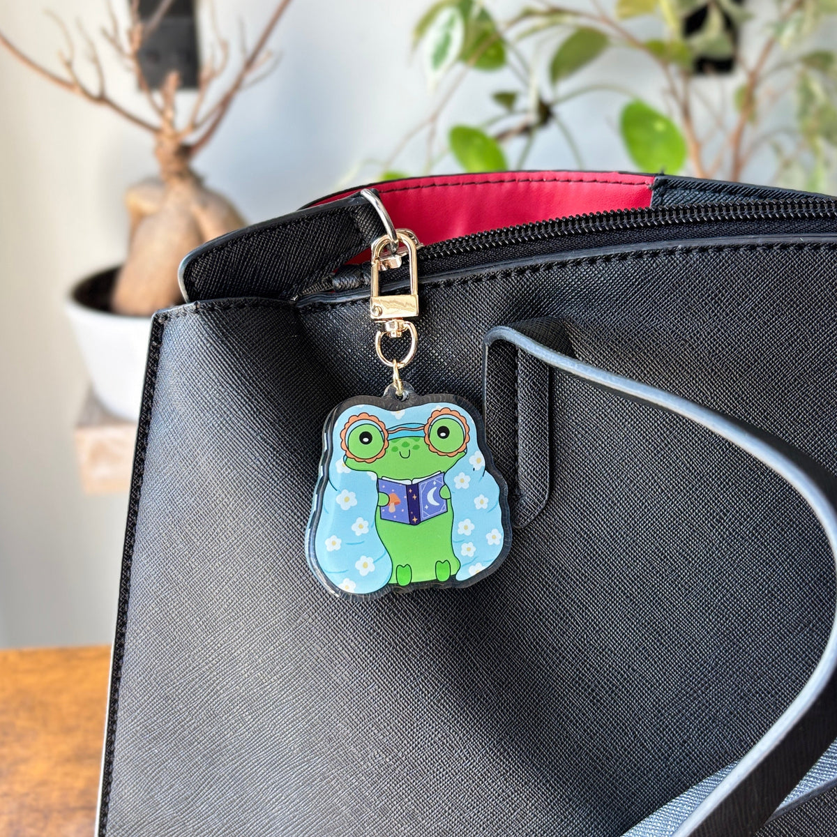 Cozy Froggy Reading Acrylic Keychain