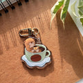 Otter Sipping Coffee in Cup Acrylic Keychain